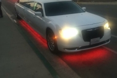 Prestige Limousine Chrysler limo - red ground lighting